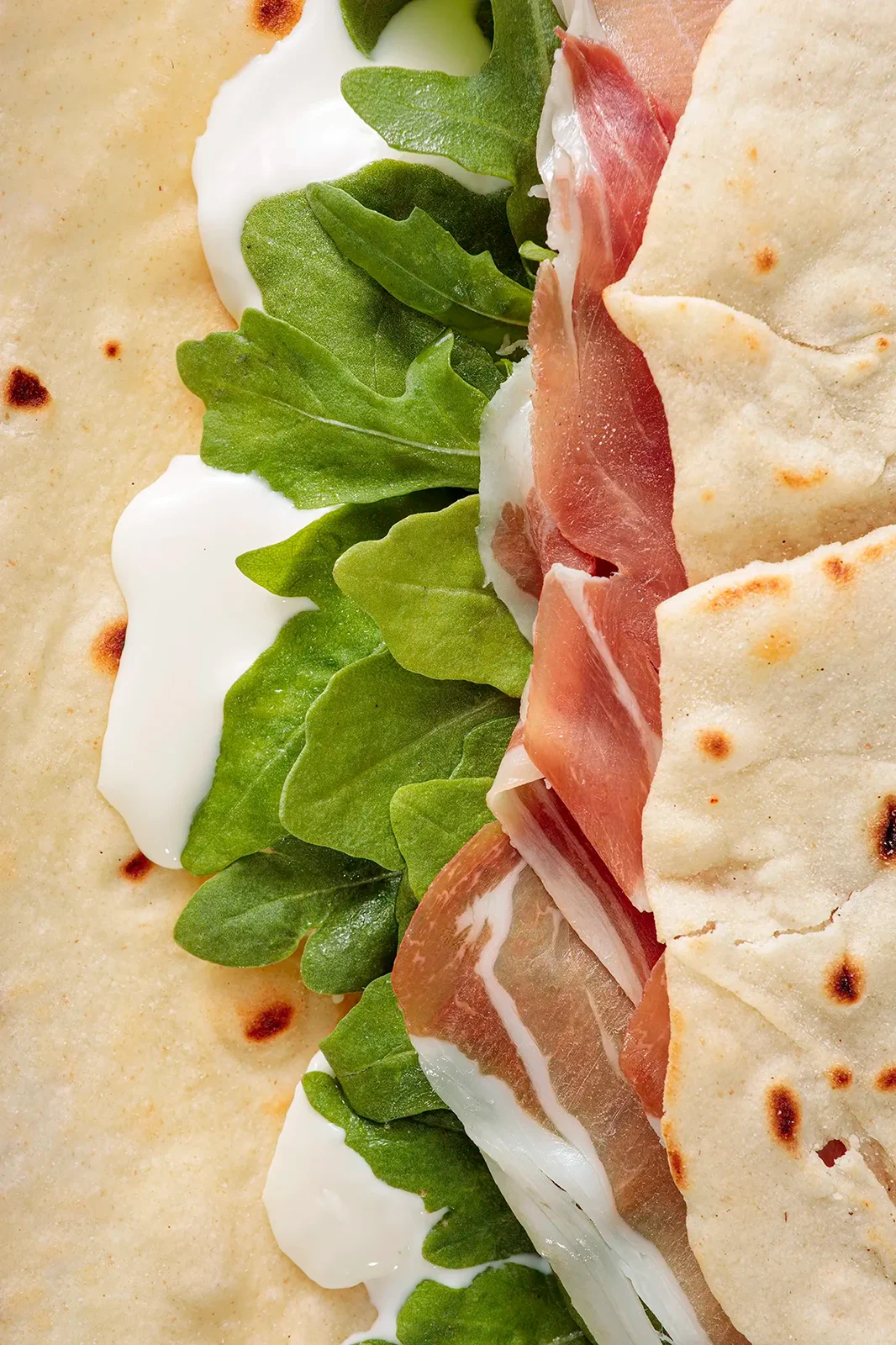 Immagine pop per presentazione piadina crudo rucola e squaquerone, immagine realizzata come progetto personale per esempio pubblicitario di foto di food